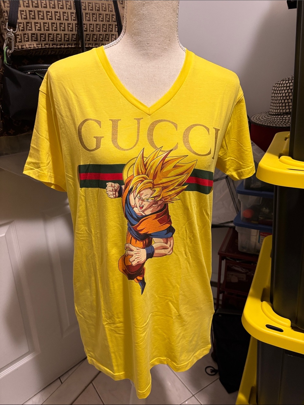 Gucci Yellow V-Neck Tee with Multicolor Superhero Graphic